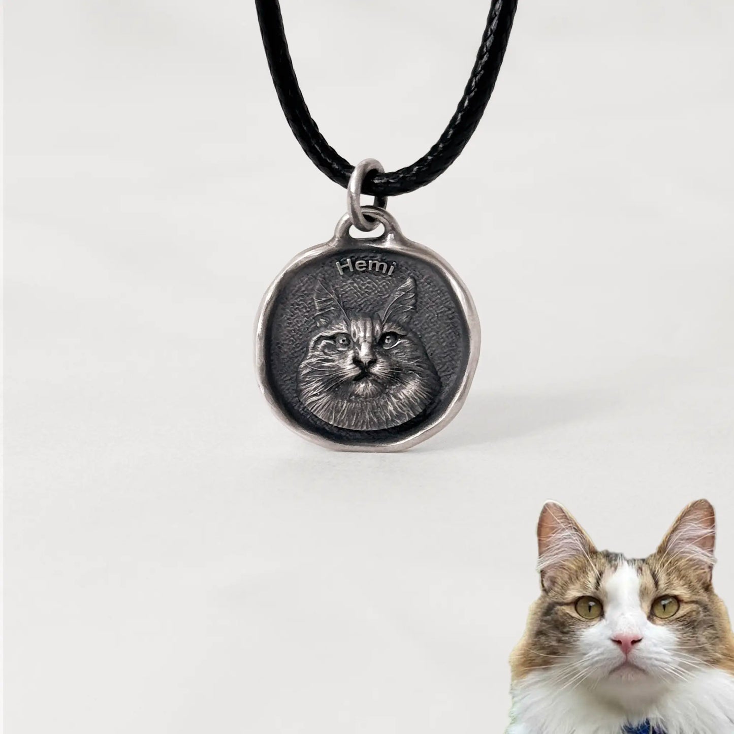 Custom cat silver pendant with engraved portrait of Hemi, keepsake jewelry with realistic detail.