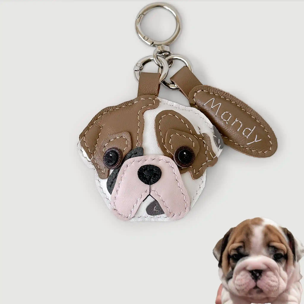 Dog-shaped keychain with 'Mandy' on a white background