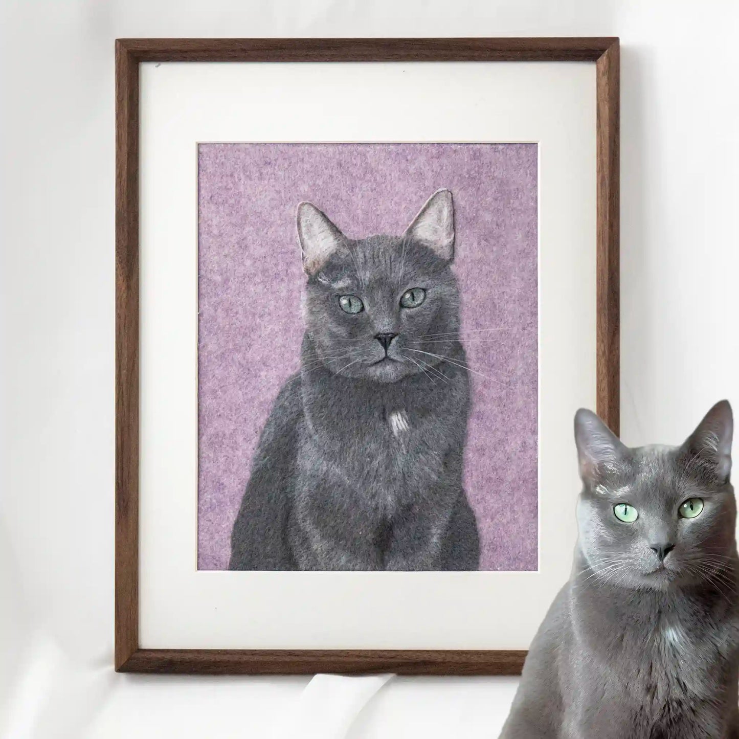 Framed wool felt portrait of Theo the Blue cat, custom-made with realistic grey tones and striking green eyes.