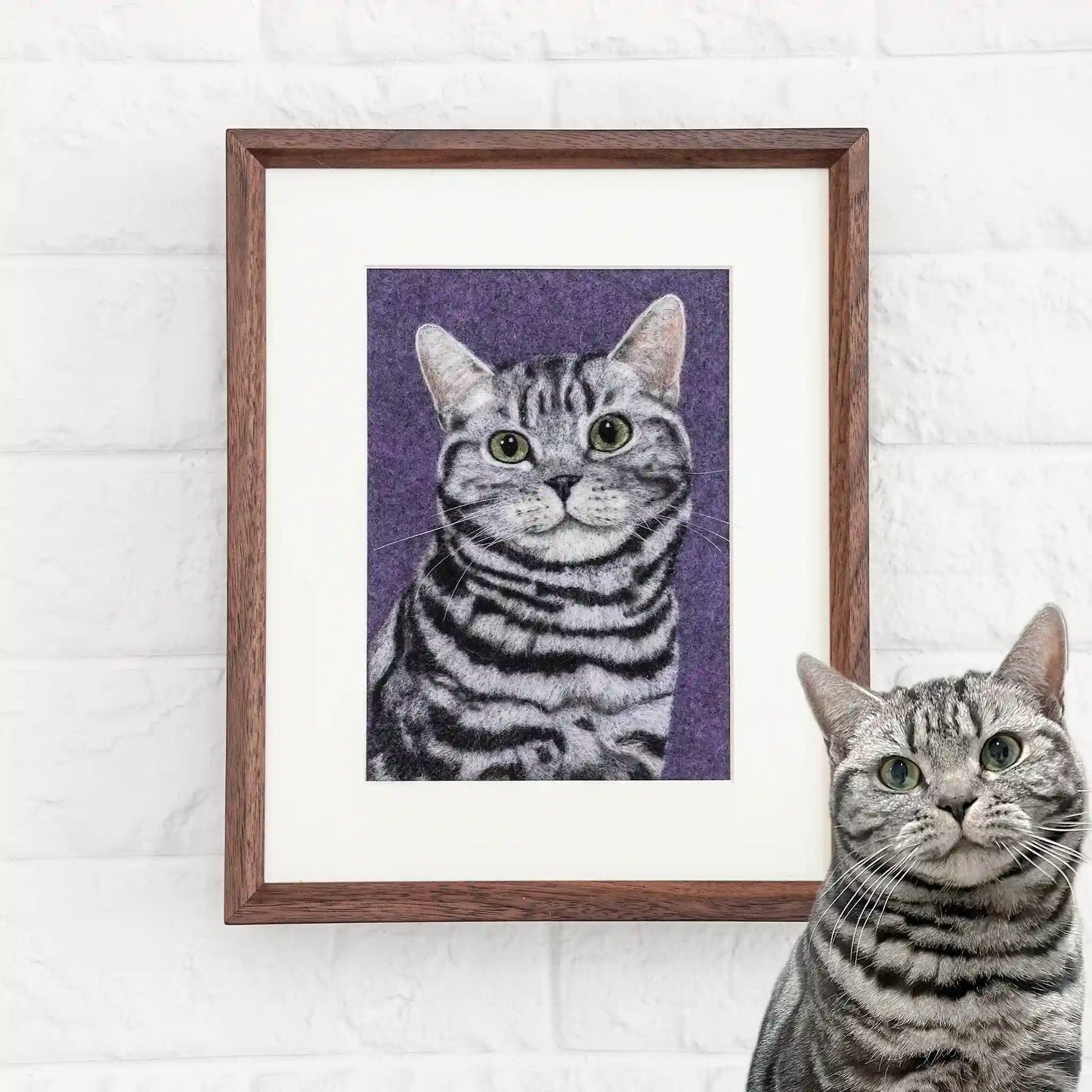 Custom wool felt portrait of Xiaoren the American Shorthair, framed in wood with a purple background and lifelike detail.