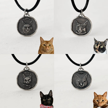 Collection of cat pendants on black cords with corresponding cat images below.