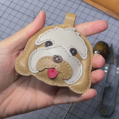 Video of crafting a custom leather keychain charm of an Australian Labradoodle, handmade pet keepsake.